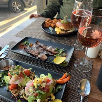 The Clinkscale - Penny mimosas, avocado toast, bacon and egg sandwich with crispy potatoes! Yum! - Breakfast & Brunch Near Me - Jerome, Arizona