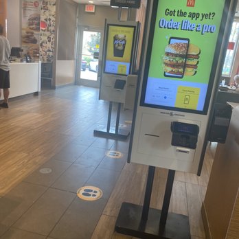 McDonald's - a large digital sign in a restaurant - Coffee & Tea Near Me - North Port, Florida