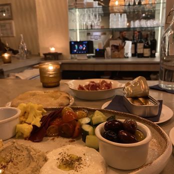 Othello - Tinned fish plate, olive oil and sea salt bread and Serrano ham. - Seafood Near Me - Jacksonville, Florida
