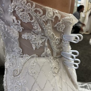 David's Bridal - They have clips so you get an accurate idea how it will look if it needs altering. - Bridal Near Me - Miamisburg, Ohio