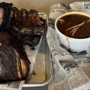 Backroads Smokehouse BBQ - The feast w/extra pulled pork (they were out of smoked sausage), brisket, ribs and smoked chicken. Sides of baked beans and mac and cheese. - Barbeque Near Me - Trenton, North Carolina
