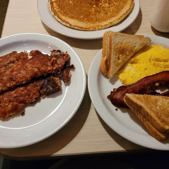 Koffee Kup Restaurant - Two eggs, bacon, toast, and perfectly crispy corned beef hash! - American Near Me - Stoughton, Wisconsin