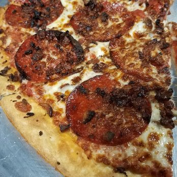 Hideout Pizzaria - Pepperoni and bacon on thin crust. - Pizza Near Me - Louisville, Kentucky Hideout Pizzaria - Pepperoni and bacon on thin crust. - Pizza Near Me - Louisville, Kentucky