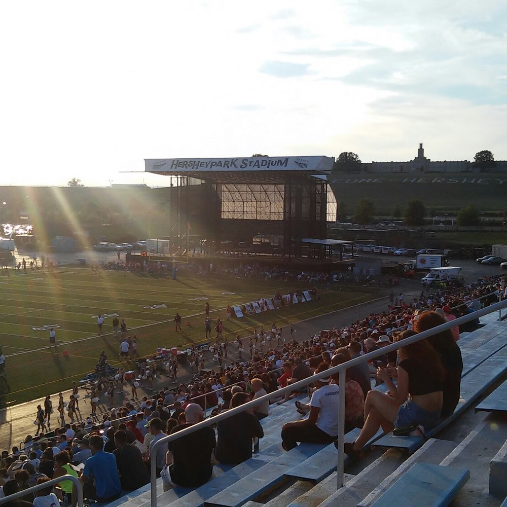 Hersheypark Stadium - Sunset with the stage and Hersey Hotel in the distance. - Stadiums & Arenas Near Me - Hershey, Pennsylvania Hersheypark Stadium - Sunset with the stage and Hersey Hotel in the distance. - Stadiums & Arenas Near Me - Hershey, Pennsylvania
