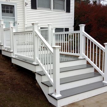 Modern Remodel Build & Design - From railroad ties on the ground to this pretty,composit main stairway - General Contractors Near Me