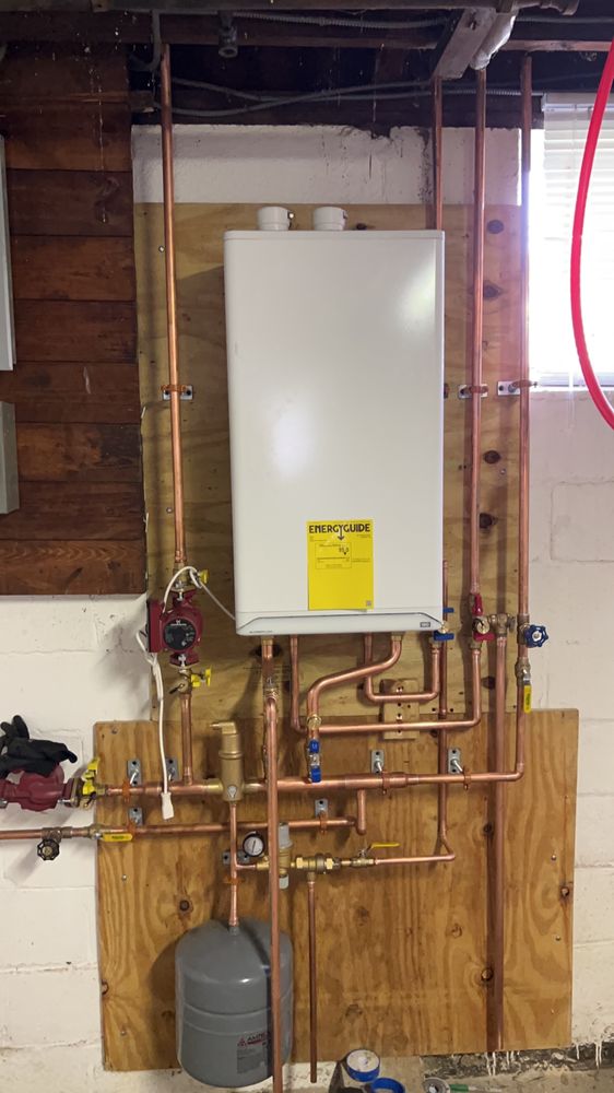 Slide of Elite Plumbing and Heating
