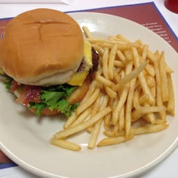 Double bacon and cheese steakburger with shoe string fries.