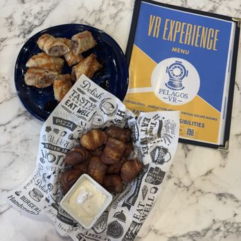 Pelagos VR - Philly cheesesteak Pelagos rolls and pretzel bites - Virtual Reality Centers Near Me - Richmond, Virginia Pelagos VR - Philly cheesesteak Pelagos rolls and pretzel bites - Virtual Reality Centers Near Me - Richmond, Virginia