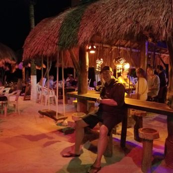 La Buena Vida - Swing chairs at the bar for karaoke night - Bars Near Me - Akumal, ROO La Buena Vida - Swing chairs at the bar for karaoke night - Bars Near Me - Akumal, ROO