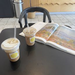 Humanity Iced coffee with Sea Salt Foam alongside a beautiful Monet picture book provided by Humanity. Humanity Iced coffee with Sea Salt Foam alongside a beautiful Monet picture book provided by Humanity.