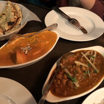 Cardamom - Chicken makhani (left) and channa pindi (right) - Indian Near Me - Ann Arbor, Michigan