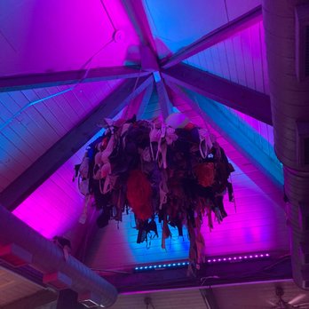Coyote Ugly Saloon - a purple and blue light in the ceiling - Sports Bars Near Me - Panama City Beach, Florida