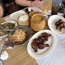 Pho Bowl - Combination Pad Thai, Papaya salad, chicken wings, Laos sausage, and sticky rice