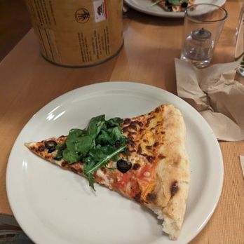 Cosmos Snack Bar - Cheese pizza with olives and arugula - Pizza Near Me - Reno, Nevada