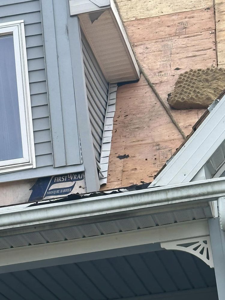 Slide of Quality Roofing Services