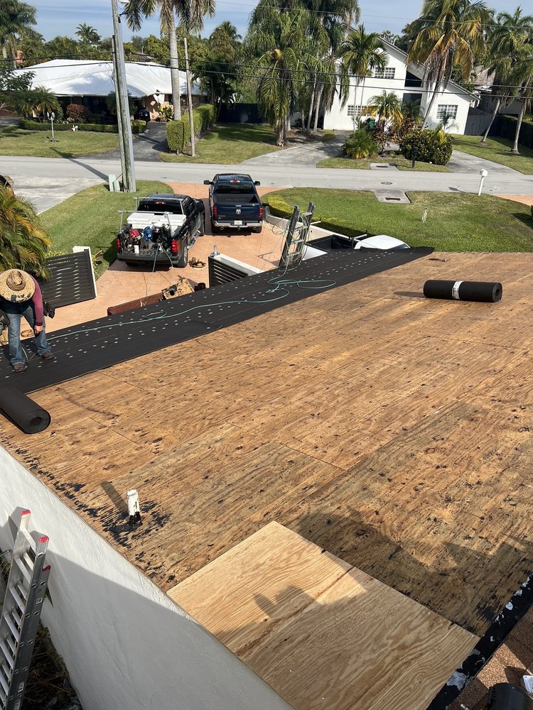 Slide of Master Roofing Group