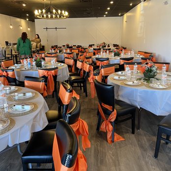 Bespoke Events - a dining room with orange and black decor - Venues & Event Spaces Near Me - Winthrop Town, Massachusetts