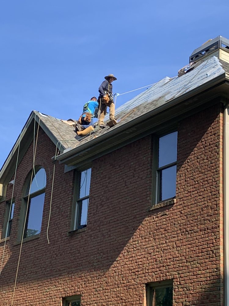 Slide of ProsTouch Roofing