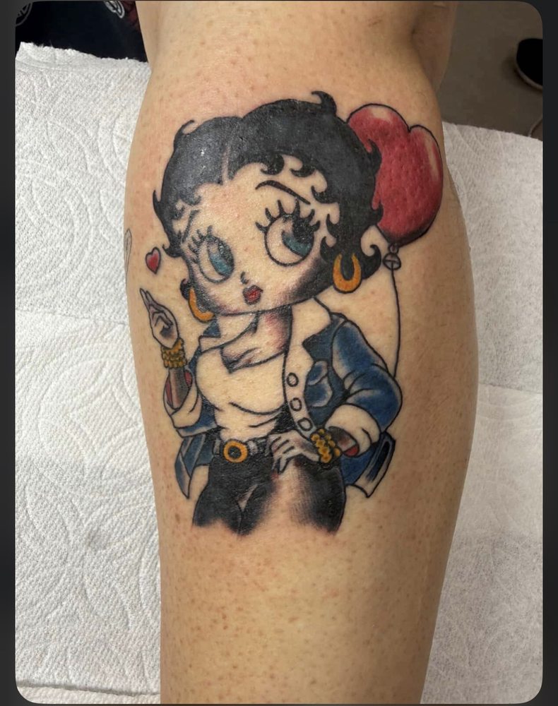 Lucky Dollar Tattoo Parlor Logo