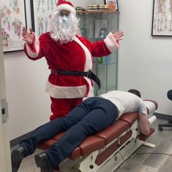 Momentum Health Creekside - Happy Holidays from our new chiropractor Dr. Santa!