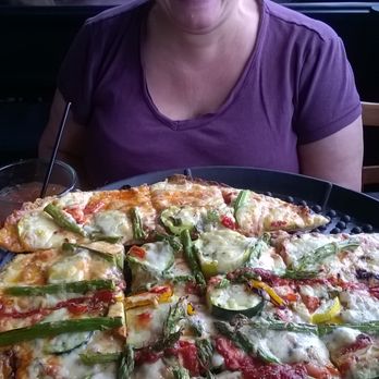 Silver Beach Pizza - Still life with sister and Sunburst pizza. - Pizza Near Me - Saint Joseph, Michigan