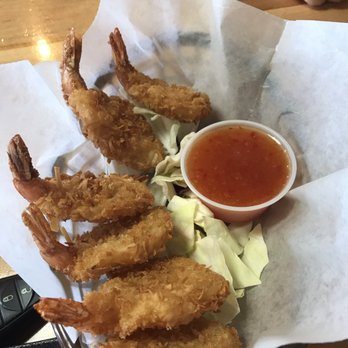 Coconuts Fish Cafe - Coconut shrimp with a tangy sweet chili sauce... - Seafood Near Me - Kihei, Hawaii Coconuts Fish Cafe - Coconut shrimp with a tangy sweet chili sauce... - Seafood Near Me - Kihei, Hawaii