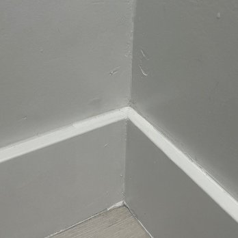Colony Construction, Inc. - Wrong color paint used on base to cover over poor paint job. They did not use the same color paint on the baseboards as they did on walls! - General Contractors Near Me - Sacramento, California
