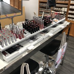Merle Norman Cosmetics - Our motto "try before you buy"; check out our lip colors (regular, liquid, pencils and long-wearing) from our new consultation table!