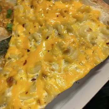 Ian's Pizza Milwaukee | Downtown - a slice of cheese pizza - Pizza Near Me - Milwaukee, Wisconsin