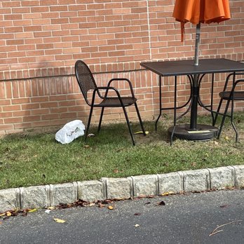 Saladworks - a table and chairs in front of a brick wall - Vegetarian Near Me - Galloway, New Jersey