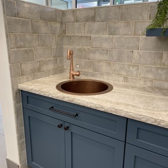 Bedrosians Tile & Stone - a sink with a copper faucet - Flooring Near Me - Reno, Nevada Bedrosians Tile & Stone - a sink with a copper faucet - Flooring Near Me - Reno, Nevada