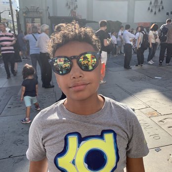 Hot Topic - Cool kid with his first pair of shades - Women's Clothing Near Me - Hollywood, California Hot Topic - Cool kid with his first pair of shades - Women's Clothing Near Me - Hollywood, California