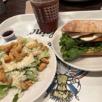 la Madeleine - Caesar salad with sweet tea and a caprese  sandwich - Bakeries Near Me - Sugar Land, Texas