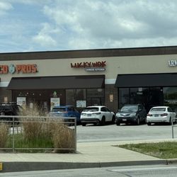 Lucky Wok - Strip mall storefront.