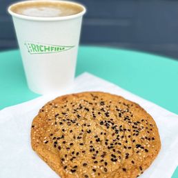 Hōjicha Latte ($5.75) w/ oat milk (+$1) & Rosalind Bakery Sesame Cookie ($2.60) Hōjicha Latte ($5.75) w/ oat milk (+$1) & Rosalind Bakery Sesame Cookie ($2.60)