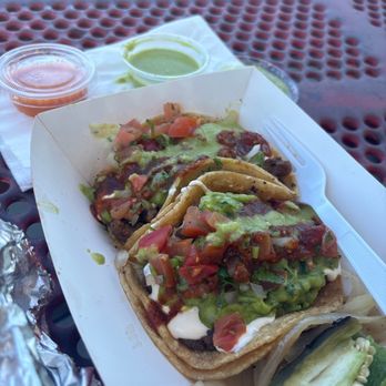 Amelia's Kitchen - Two super tacos de asada. Really good! I like the spices of the green salsa!! - Food Trucks Near Me - Fremont, California