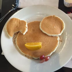 What happened to Mickey's ear? Enjoying a leisurely family breakfast on opening day. Love the new location- food is still great.