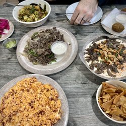 Ground Eggs with Sujuk,  Falafels, Spicy Potatoes, and Fatteh Tahini with Ground Meat!
