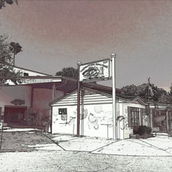 Fisherman's Ideal Supply House - Recreational store in front - Commercial garage in back.