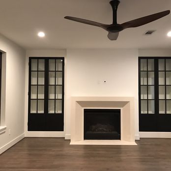 GQ Homes & Construction - Another custom design. Custom metal doors and limestone fireplace - General Contractors Near Me GQ Homes & Construction - Another custom design. Custom metal doors and limestone fireplace - General Contractors Near Me