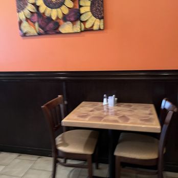The Pita House - a table and two chairs - Middle Eastern Near Me - Alexandria, Virginia