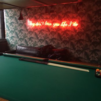 Fitzroy - a pool table with a neon sign above it - Lounges Near Me - Montreal, Quebec