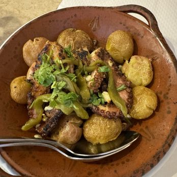 Sardinia - Octopus with potatoes. The fish here is fresh and delicious. - Seafood Near Me Sardinia - Octopus with potatoes. The fish here is fresh and delicious. - Seafood Near Me