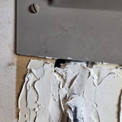 Universal Electric PNW - Why is there still a hole in the wall if this is supposed to be a sufficient patch job?