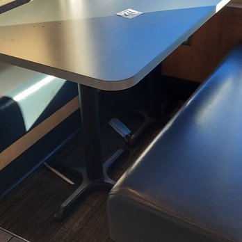 Culver's - A used disposable mask under the table. - Fast Food Near Me - Queen Creek, Arizona