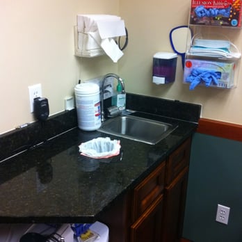 Ridge Martin Construction - Dentist Office After: Granite counter-tops and a warm paint scheme make your dentist visit less stressful. - General Contractors Near Me - Phoenix, Arizona Ridge Martin Construction - Dentist Office After: Granite counter-tops and a warm paint scheme make your dentist visit less stressful. - General Contractors Near Me - Phoenix, Arizona