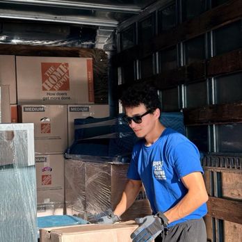 Simple Case Moving - Storing boxes in the truck - Movers Near Me Simple Case Moving - Storing boxes in the truck - Movers Near Me