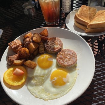 Sage Biscuit Cafe - Downtown - 2 eggs over easy and sausage Pattie's with potatoes and sourdough toast - Breakfast & Brunch Near Me - Bradenton, Florida