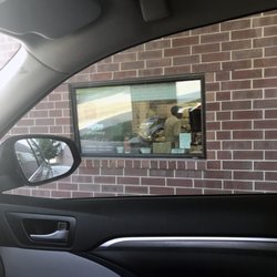 In the drive-thru the pharmacy is located on the passenger side of your vehicle. Very awkward.