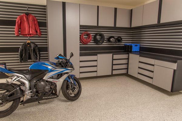 Garage Slatwall in Madison - Garage Slatwall in Madison
Versatile Storage, Organization & Display Options
Whether you’re looking for additional storage options or want to create a display in your garage, GarageExperts® offers slatwall organization that will suit your various needs. We offer several colors to fit your style and match our custom cabinets. Our slatwall organization system allows you to organize and display just about anything using a variety of basket and hook accessories.
Slatwall is a great way to get creative with your home organization and storage by taking advantage of empty wall space. It provides versatility and convenience, and can easily be adjusted if your needs change. With GarageExperts® customizable storage solutions, using a combination of cabinets and slatwall organization, can maximize your garage space and give you more options to keep your things off the floor or out of a storage unit.
Slatwall is great for storing and organizing:
Gardening equipment
Sports equipment
Woodworking tools
Outdoor gear
Auto parts
Kids toys
Bikes
Slatwall is a great organizational option because it provides storage that is easily accessible and can store bulky items that can’t easily fit inside cabinets or on shelves, like rakes, bulky toys, golf clubs, and baseball bats. The GarageExperts® team would be happy to learn about your needs and create a customized storage plan that includes slatwall organization as well as other storage solutions. Garage Slatwall in Madison - Garage Slatwall in Madison
Versatile Storage, Organization & Display Options
Whether you’re looking for additional storage options or want to create a display in your garage, GarageExperts® offers slatwall organization that will suit your various needs. We offer several colors to fit your style and match our custom cabinets. Our slatwall organization system allows you to organize and display just about anything using a variety of basket and hook accessories.
Slatwall is a great way to get creative with your home organization and storage by taking advantage of empty wall space. It provides versatility and convenience, and can easily be adjusted if your needs change. With GarageExperts® customizable storage solutions, using a combination of cabinets and slatwall organization, can maximize your garage space and give you more options to keep your things off the floor or out of a storage unit.
Slatwall is great for storing and organizing:
Gardening equipment
Sports equipment
Woodworking tools
Outdoor gear
Auto parts
Kids toys
Bikes
Slatwall is a great organizational option because it provides storage that is easily accessible and can store bulky items that can’t easily fit inside cabinets or on shelves, like rakes, bulky toys, golf clubs, and baseball bats. The GarageExperts® team would be happy to learn about your needs and create a customized storage plan that includes slatwall organization as well as other storage solutions.